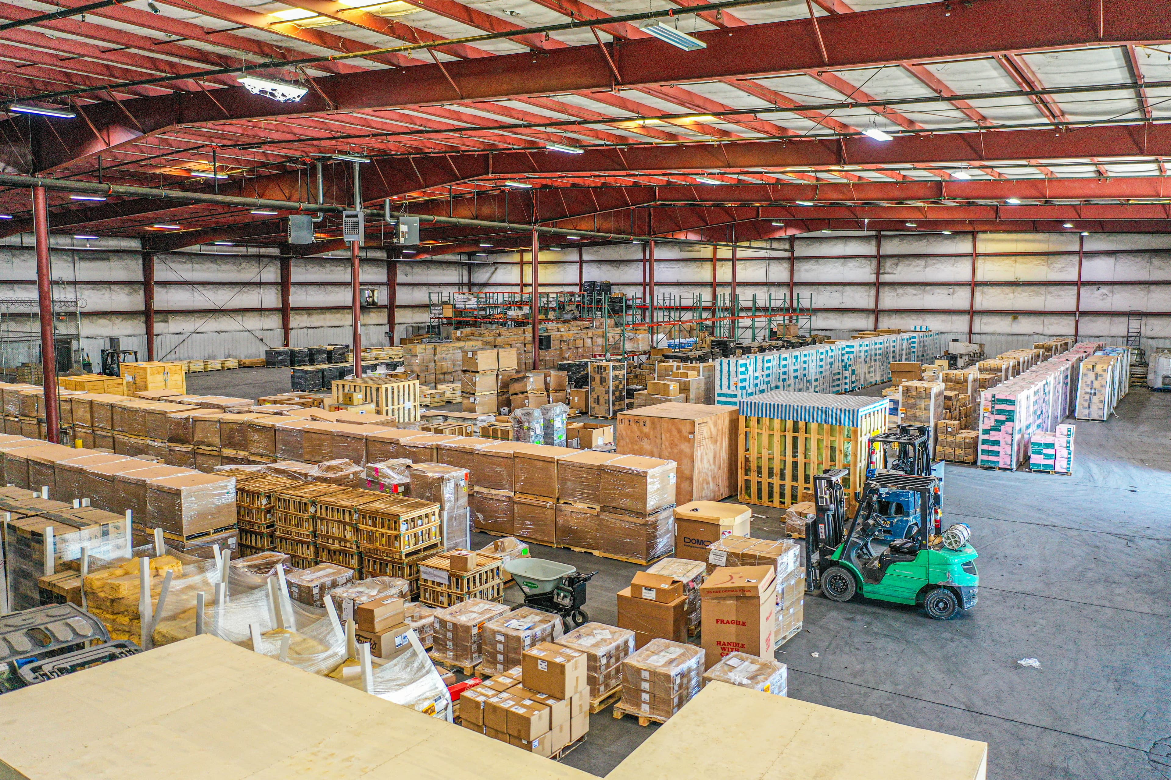 Aerial drone view of Luemar Group warehouse complex showing full facility