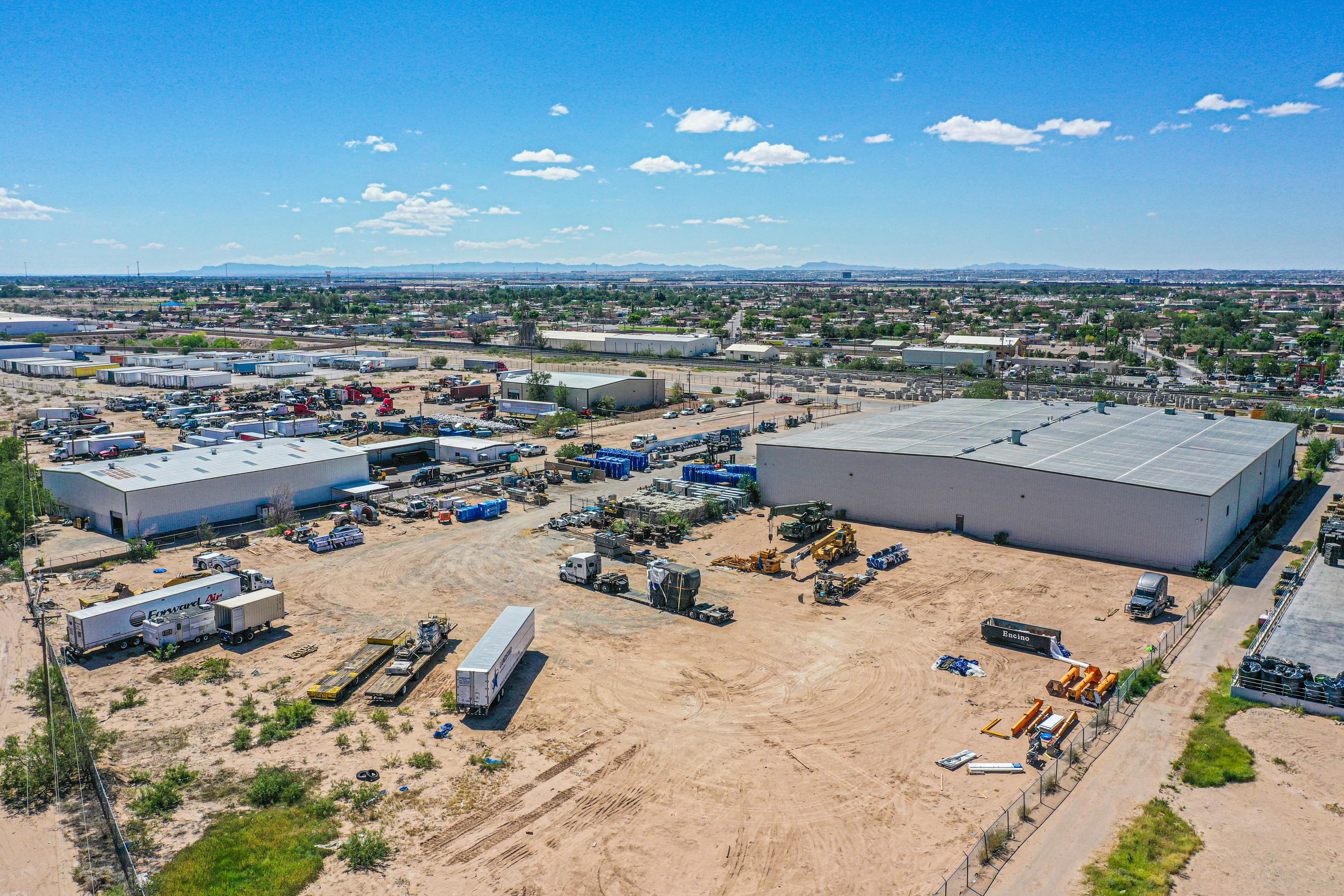 Aerial drone view of warehouse facility showing organized building arrangement