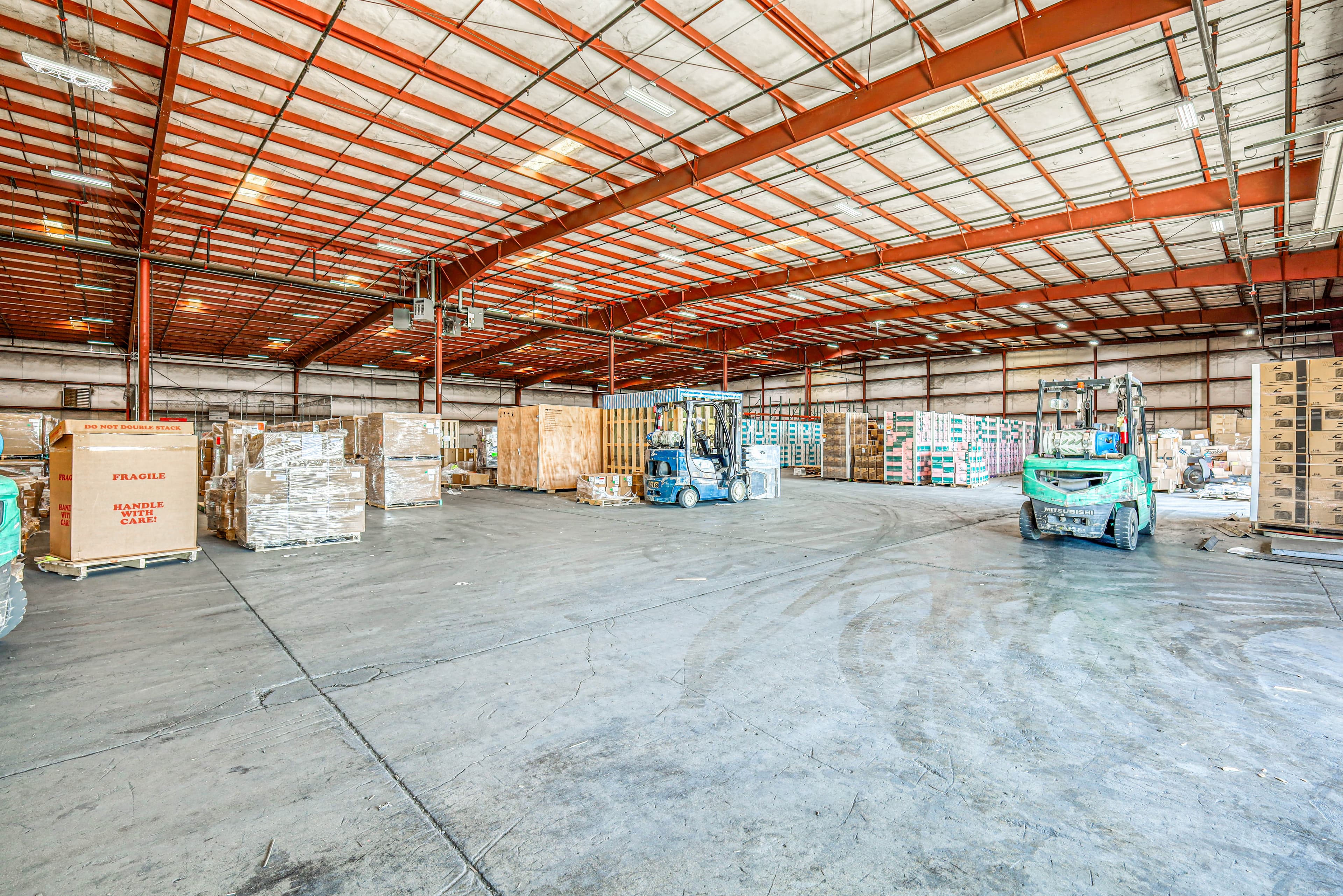 Interior warehouse view with HDR showing organized operations and storage capacity